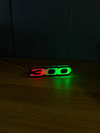 RGB Chrysler 300 Emblem LED Badge — Bluetooth Color-Chasing Light for Chrysler 300