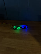RGB Chrysler 300 Emblem LED Badge — Bluetooth Color-Chasing Light for Chrysler 300