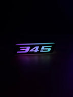 RGB 345 Emblem LED Badge — Bluetooth Color-Chasing Light