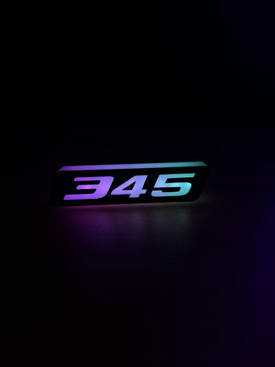 RGB 345 Emblem LED Badge — Bluetooth Color-Chasing Light