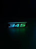 RGB 345 Emblem LED Badge — Bluetooth Color-Chasing Light